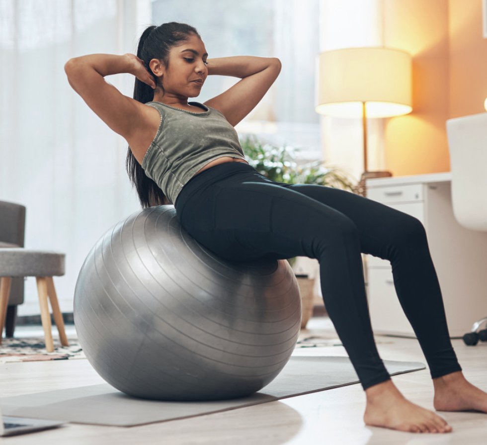 Sitting on cheap yoga ball